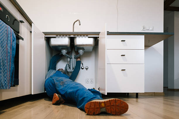 Professional Drain Cleaning technician working in Depauville, NY